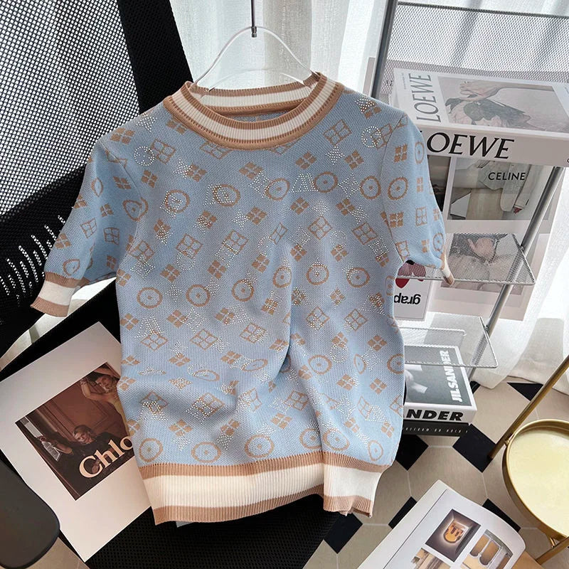 Gebreide Top met Gouden Detail en Ruches