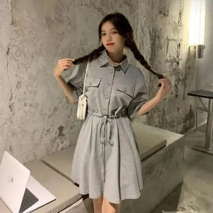 Vrouwelijke Polo Jurk met Taille en Korte Mouwen