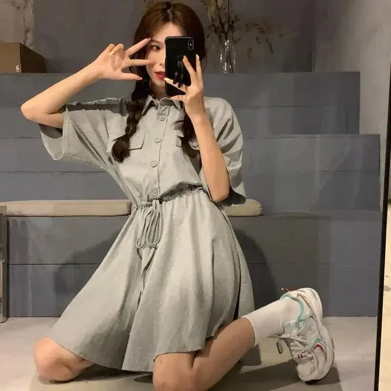 Vrouwelijke Polo Jurk met Taille en Korte Mouwen
