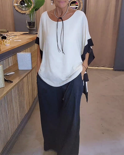 Vrouwelijke Blouse met Contrasterende Borden en Wijd Model