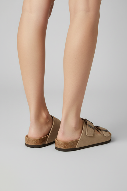 Beige cork footbed sandals diagonal back angle