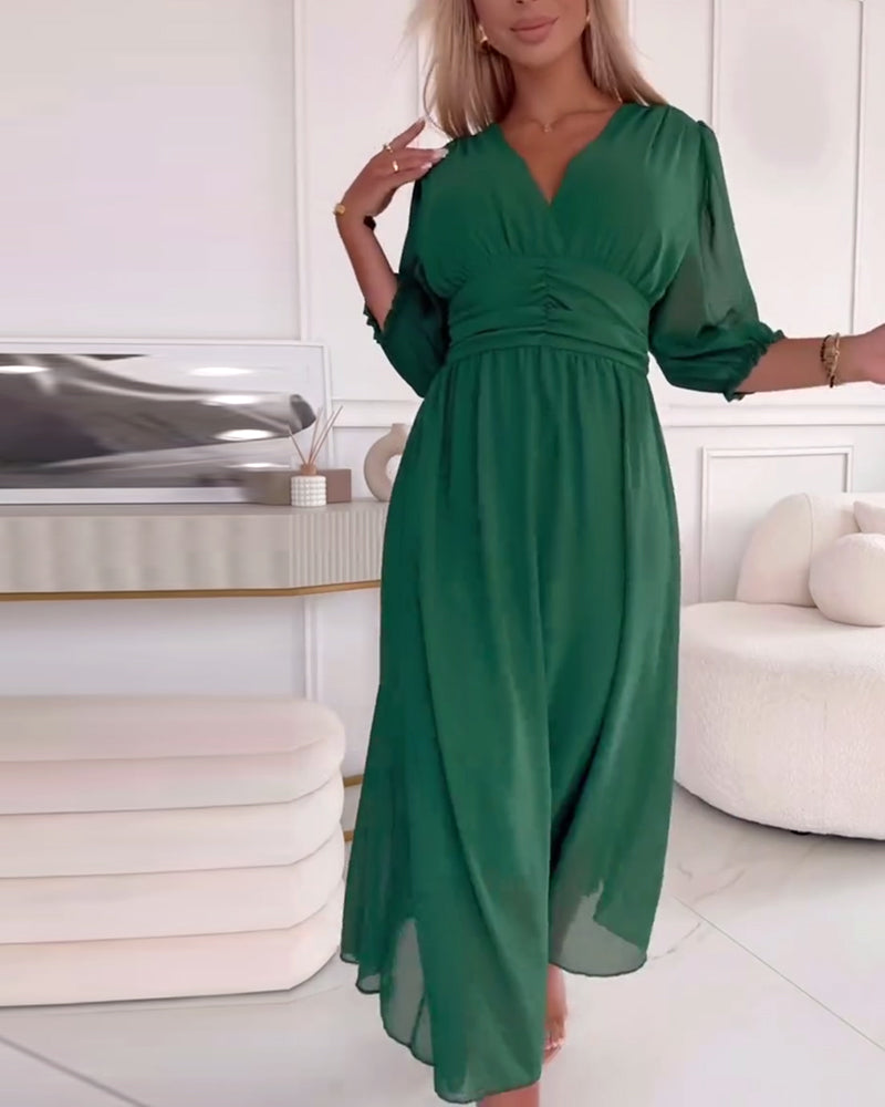 Vrouwelijke Jurk met V-Hals en Taille