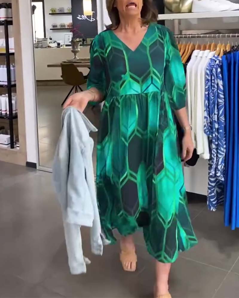 Vrouwelijke Jurk met V-hals en Bloemenprint