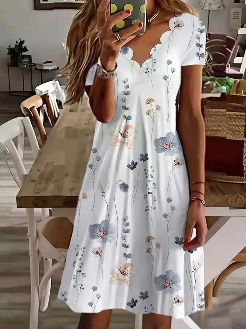 Vrouwelijke Bloemenjurk met Parelmoer Details - StudioMarella