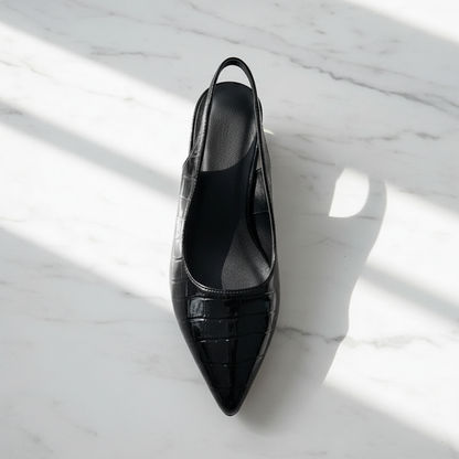 Elegante slingback pump flat lay