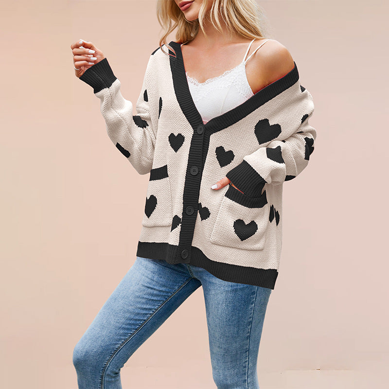 Dames Gebreide Vest met Hartjes en Contrasterende Details wordt 
Dames Vest Gebreid met Hartjes en Kleurrijk Detail