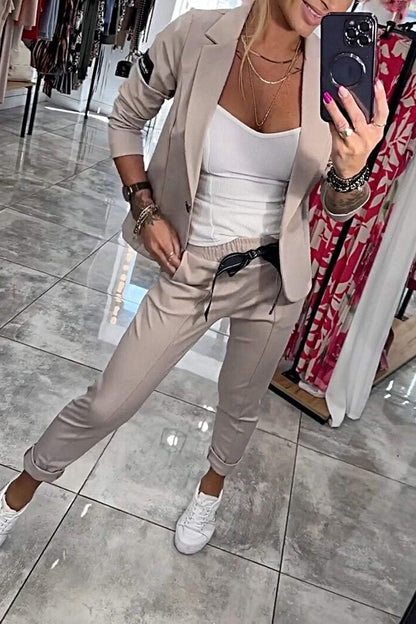 Vrouwelijke Broek en Top Set