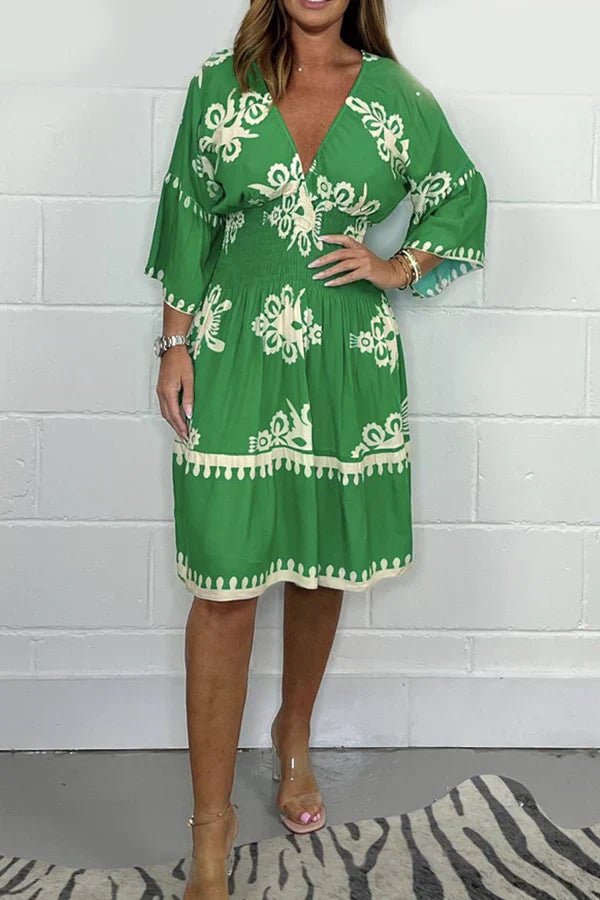 Vrouwelijke Jurk met V-hals en Prints - StudioMarella