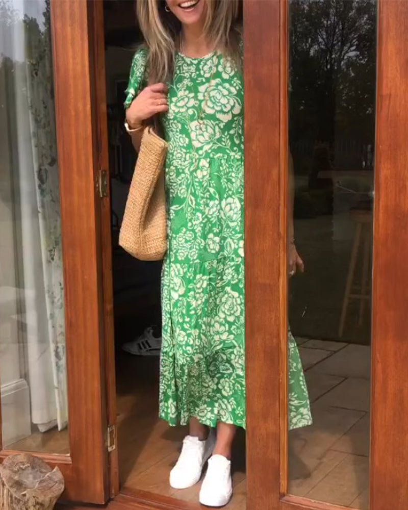 Lange jurk met korte mouwen en een bloemenprint in de kleur Groen voor dames in stijl ideaal voor de herfst.