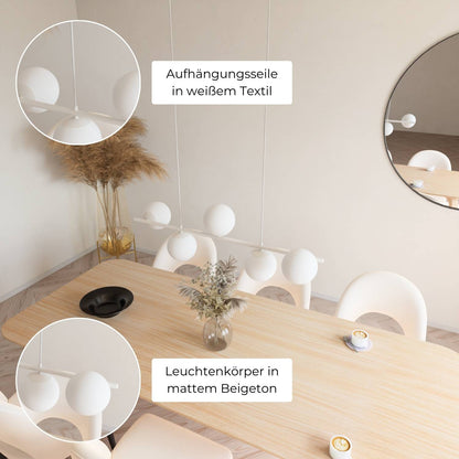 Moderne design hanglamp met 5 opaalglazen bollen boven eettafel – Eloria