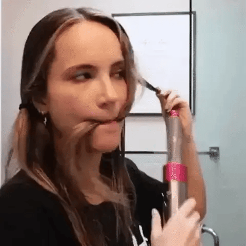Professionele 5-in-1 airstyler met opzetstukken en luchttechnologie voor drogen, krullen, volume en glad haar