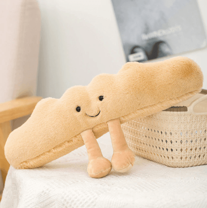 Zacht pluche knuffelbrood in speelse vormen voor kinderen en volwassenen