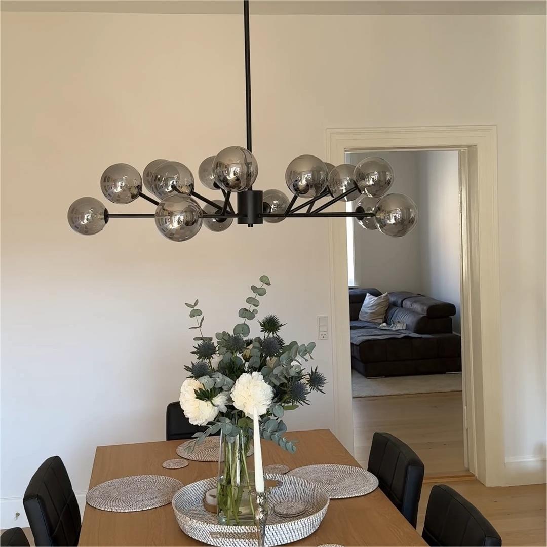 Moderne lineaire sputnik kroonluchter met 15 glazen bollen in zwart of messing – design hanglamp 112 cm
