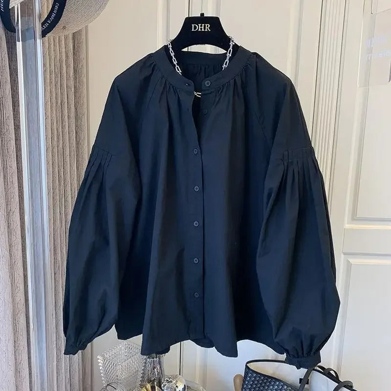 Vrouwelijke Oversized Top met Pofmouwen voor een Retro Look - StudioMarella