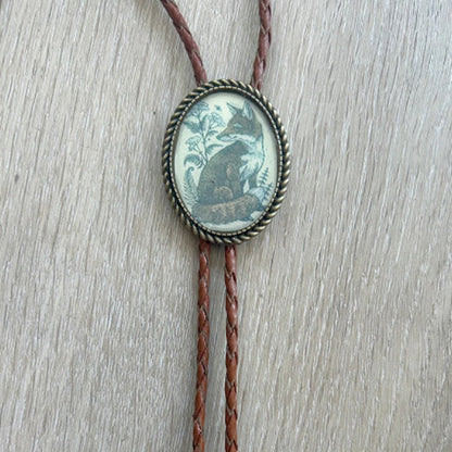 Western Bolo Tie met Kikker en Banjo Motief – Verstelbaar Leren Stropdas voor Authentieke Cowboystijl